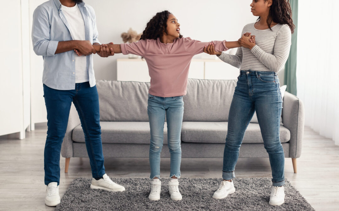 Divorce. Angry black parents fighting over their child